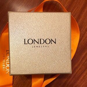 Gold Gift Box with Orange Ribbon